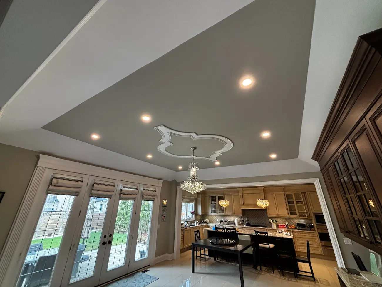 Modern recessed pot light layout with coffered ceiling and balanced lighting